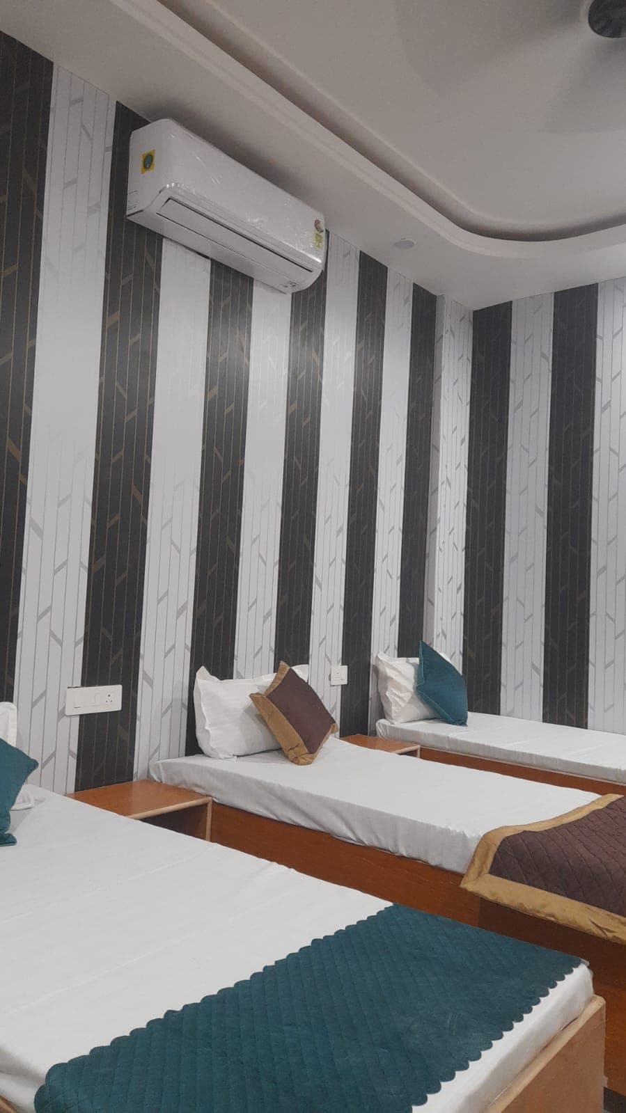 Well-lit living space at Shree Shyam hostels with compact design